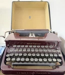 Vintage Smith Corona 1930 Maroon Flat Top Typewriter & Travel Case. Fixed Price $299.99.