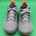 Size 7.5-ASICS Gel Pulse 14 Light Sage Orange. Fixed Price $49.99.